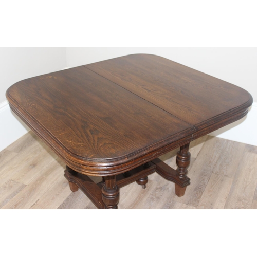 33 - A 19th century dining table, believed to be French oak with reeded legs, approx 112cm wide (extendin... 