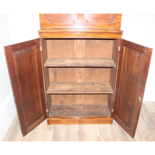 34 - A very unusual Mahogany cupboard or standing clerks desk, the top with drop down front concealing 6 ... 