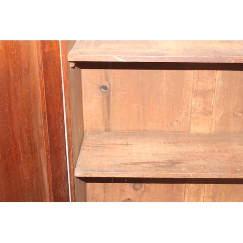 34 - A very unusual Mahogany cupboard or standing clerks desk, the top with drop down front concealing 6 ... 