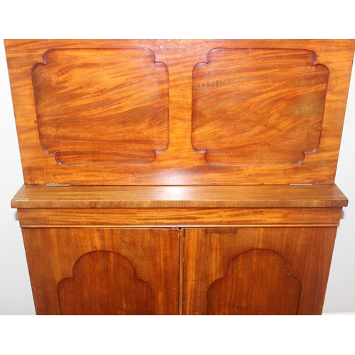 34 - A very unusual Mahogany cupboard or standing clerks desk, the top with drop down front concealing 6 ... 