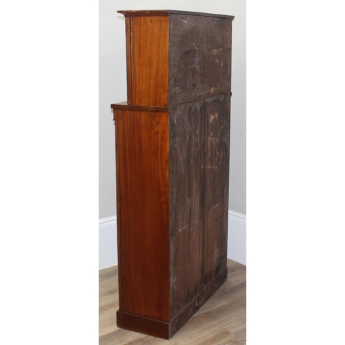 34 - A very unusual Mahogany cupboard or standing clerks desk, the top with drop down front concealing 6 ... 