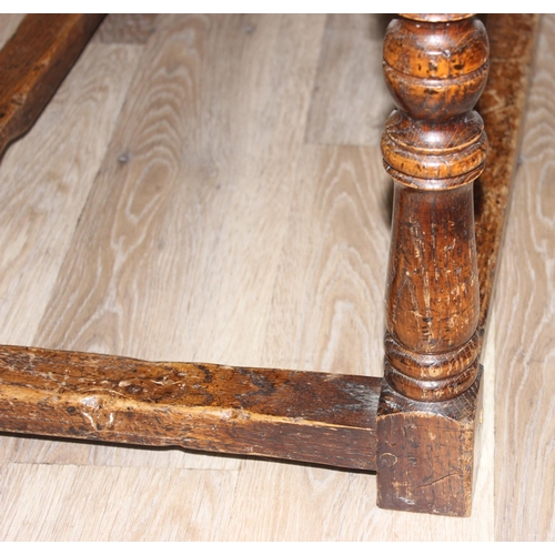 55 - An 18th century style low oak coffee table of wake table form with 2 drop leaves, approx 122cm wide ... 