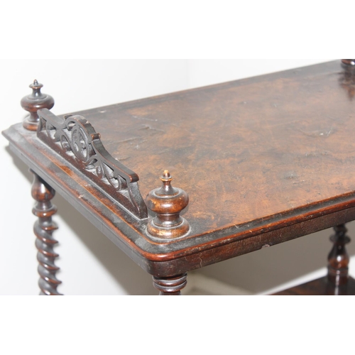 58 - A 19th century walnut whatnot with 3 tiers separated by barley-twist supports, with fretwork gallery... 