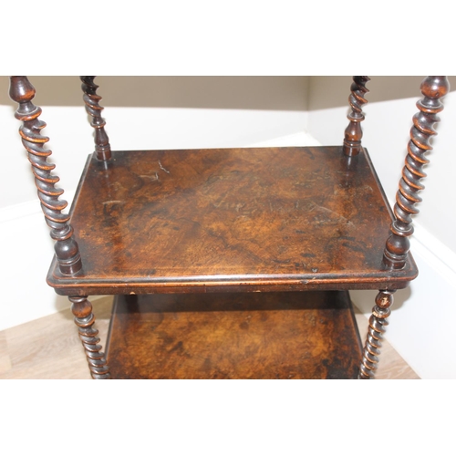 58 - A 19th century walnut whatnot with 3 tiers separated by barley-twist supports, with fretwork gallery... 