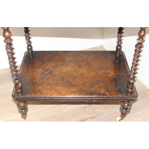 58 - A 19th century walnut whatnot with 3 tiers separated by barley-twist supports, with fretwork gallery... 