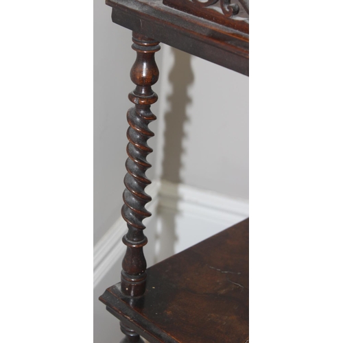 58 - A 19th century walnut whatnot with 3 tiers separated by barley-twist supports, with fretwork gallery... 