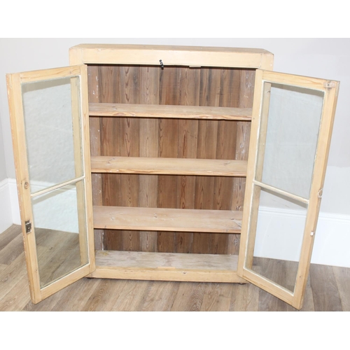 59 - An antique stripped pine bookcase or display cabinet with 3 shelves, approx 100cm wide x 30cm deep x... 