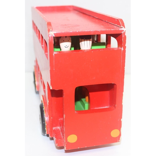 601 - An interesting vintage scratch built wooden model of a London bus with passengers and a wooden toy f... 