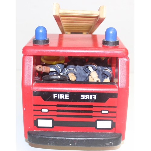 601 - An interesting vintage scratch built wooden model of a London bus with passengers and a wooden toy f... 