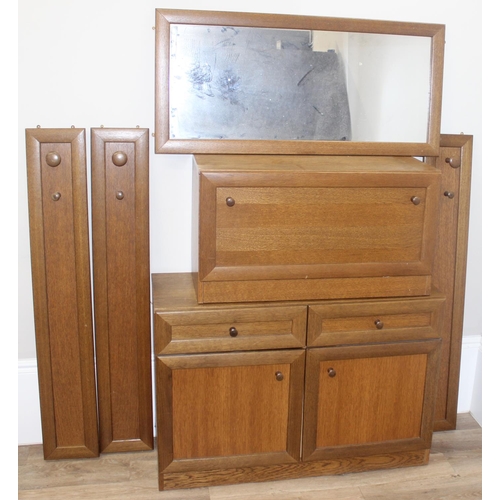 62 - Qty of assorted retro teak modular furniture to include wall units, coat hooks and mirror etc, large... 