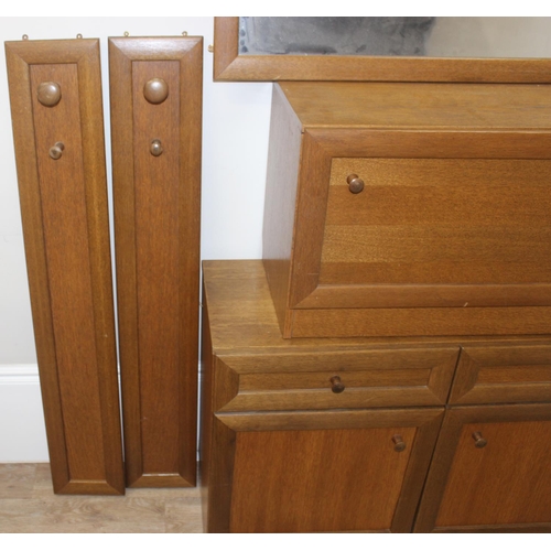 62 - Qty of assorted retro teak modular furniture to include wall units, coat hooks and mirror etc, large... 