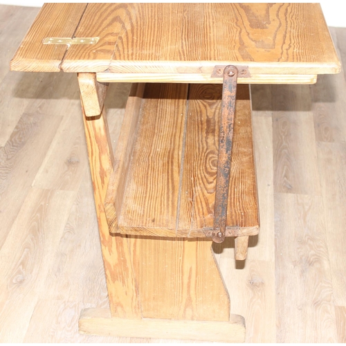 64 - A very unusual metamorphic pitch pine bench or pew transforming into a long table, likely late 19th ... 