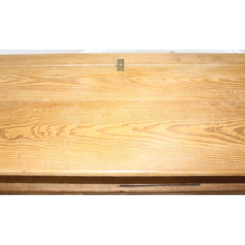 64 - A very unusual metamorphic pitch pine bench or pew transforming into a long table, likely late 19th ... 