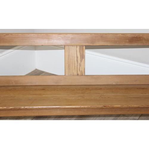 65 - A very unusual metamorphic pitch pine bench or pew with movable back allowing it to be sat one side ... 