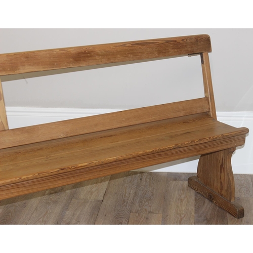 65 - A very unusual metamorphic pitch pine bench or pew with movable back allowing it to be sat one side ... 