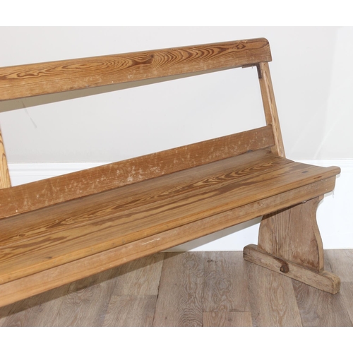 66 - A very unusual metamorphic pitch pine bench or pew with movable back allowing it to be sat one side ... 