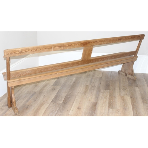 66 - A very unusual metamorphic pitch pine bench or pew with movable back allowing it to be sat one side ... 