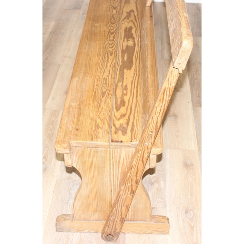 66 - A very unusual metamorphic pitch pine bench or pew with movable back allowing it to be sat one side ... 