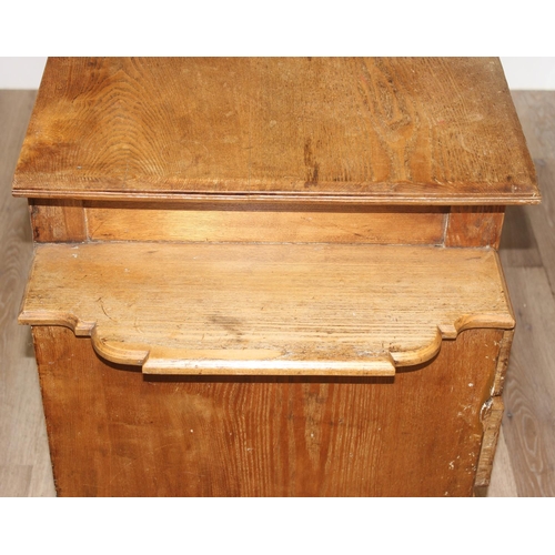 67 - An early 20th century light oak desk with 8 drawers and brass handles, unusual construction, approx ... 