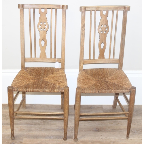 68 - A set of 4 Arts & Crafts period chairs with rush seats, 2 carver and 2 dining, the carvers approx 10... 