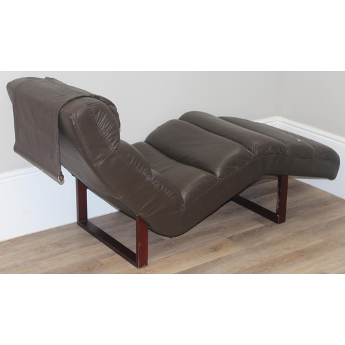 72 - A retro style brown faux lounger and associated footstool, the lounger approx 170cm long x 68cm deep... 