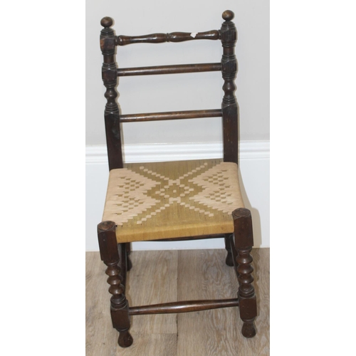 73 - An Art Deco period circular walnut side table and a small antique oak chair with turned supports and... 