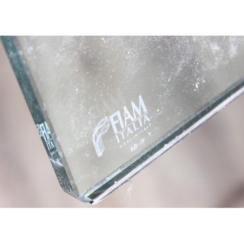 9 - A retro style shaped glass coffee table by Fiam of Italy, etched mark, approx 130cm wide x 70cm deep... 