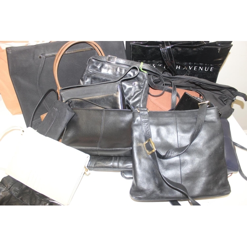 206 - Qty of mixed ladies' handbags, tote bags and shopping bags, to incl Radley, Saks Fifth Avenue, a pai... 