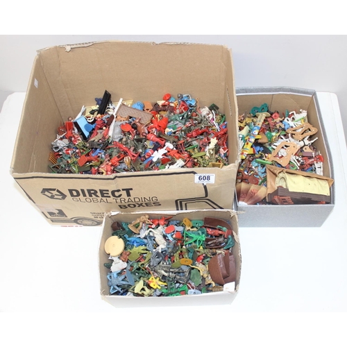 608 - A huge qty of assorted vintage plastic toy figures to inc cowboys and Indians and soldiers, some by ... 