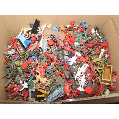 608 - A huge qty of assorted vintage plastic toy figures to inc cowboys and Indians and soldiers, some by ... 