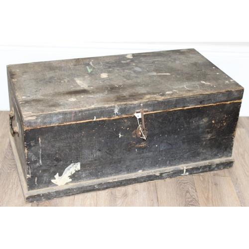 719 - A large vintage stained pine tool box with extensive contents to inc a number of wooden planes, saws... 