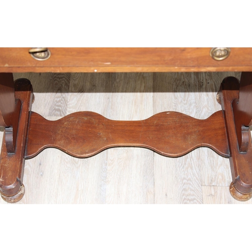 79 - A 19th century mahogany clerks' desk or wash stand with single drawer and brass ring handles, approx... 