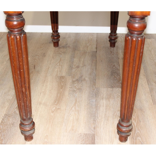 82 - A Victorian mahogany desk, hall table or buffet stand with hidden frieze drawer and reeded legs, app... 