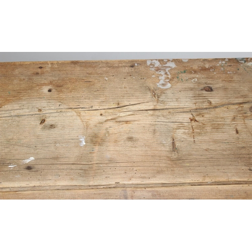 91 - An antique pine rustic farmhouse table with painted base, approx 132cm wide x 74cm deep x 70cm tall