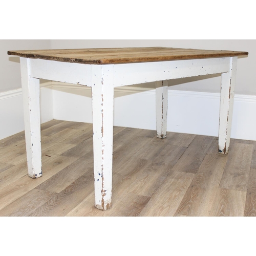 91 - An antique pine rustic farmhouse table with painted base, approx 132cm wide x 74cm deep x 70cm tall