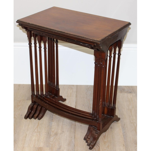 94 - An Edwardian style mahogany nest of 4 tables with turned legs, the largest approx 56cm wide x 35cm d... 