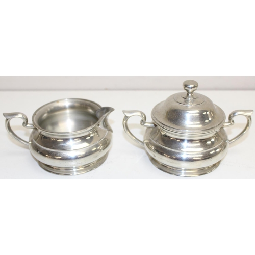 1043 - Qty of assorted Royal Selangor pewter items to inc a 3 piece tea set, and 2 boxed engraved chargers,... 