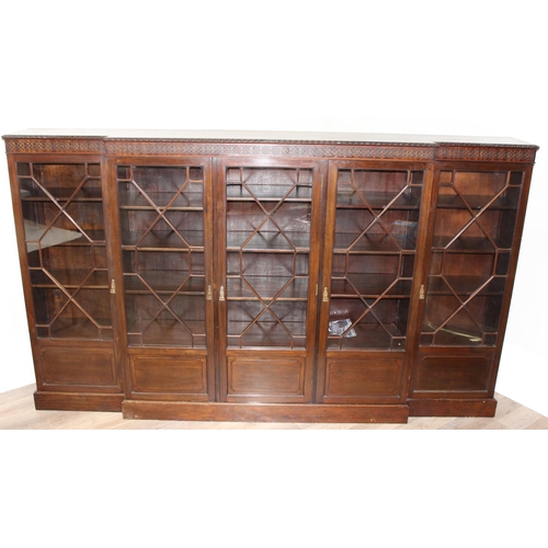 110 - A Chippendale style 5 door mahogany breakfront bookcase with astral glazed doors, approx 275cm wide ... 