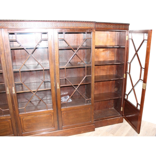 110 - A Chippendale style 5 door mahogany breakfront bookcase with astral glazed doors, approx 275cm wide ... 