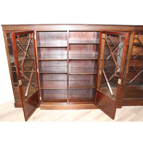 110 - A Chippendale style 5 door mahogany breakfront bookcase with astral glazed doors, approx 275cm wide ... 