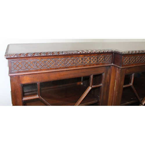 110 - A Chippendale style 5 door mahogany breakfront bookcase with astral glazed doors, approx 275cm wide ... 