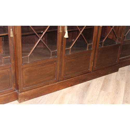 110 - A Chippendale style 5 door mahogany breakfront bookcase with astral glazed doors, approx 275cm wide ... 