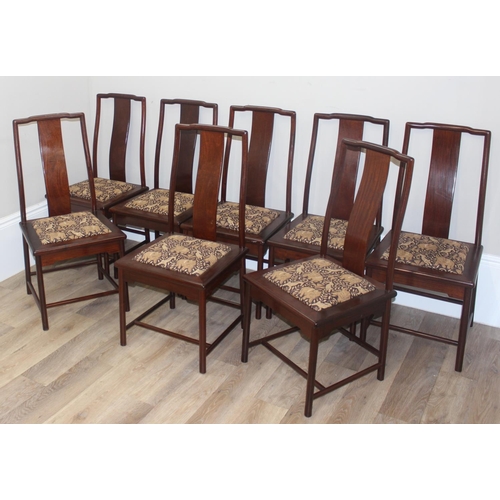 112 - A set of 10 (8 + 2 carvers) Chinese hardwood dining chairs with later animal fabric seats, each appr... 