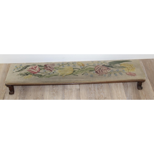 115 - A long low footstool with tapestry top and paw feet and 2 other vintage footstools, the largest appr... 