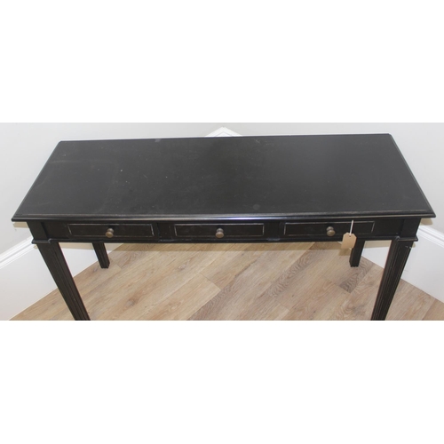 117 - A vintage black painted hall table with 3 drawers, approx 136cm wide x 45cm deep x 73cm tall