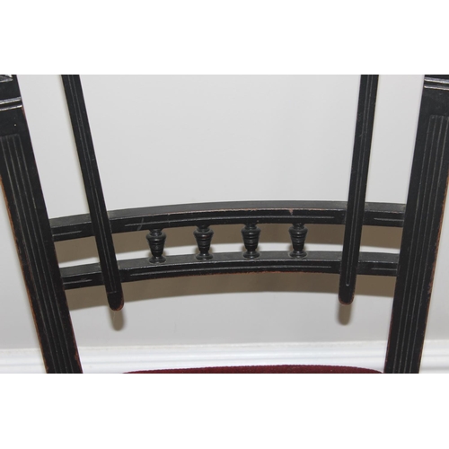 120 - A set of 4 19th century ebonised chairs with red velvet stuffed upholstered seats, each approx 80cm ... 