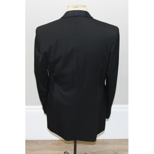 211 - S.K Charlie custom tailor of Hong Kong tuxedo suit comprising of a jacket and trousers, approximate ... 