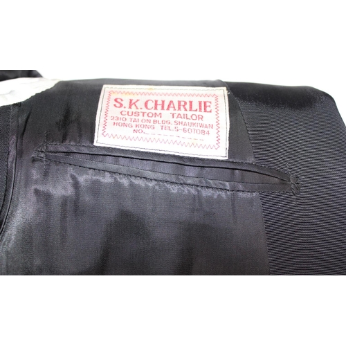 211 - S.K Charlie custom tailor of Hong Kong tuxedo suit comprising of a jacket and trousers, approximate ... 