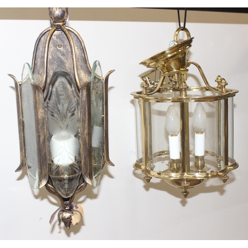 246 - An antique style brass hall lantern with curved glass panels and a distressed metal and etched glass... 