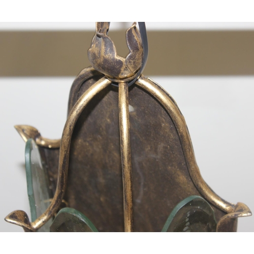 246 - An antique style brass hall lantern with curved glass panels and a distressed metal and etched glass... 